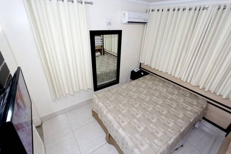 Foto do quarto no diRoma Resort